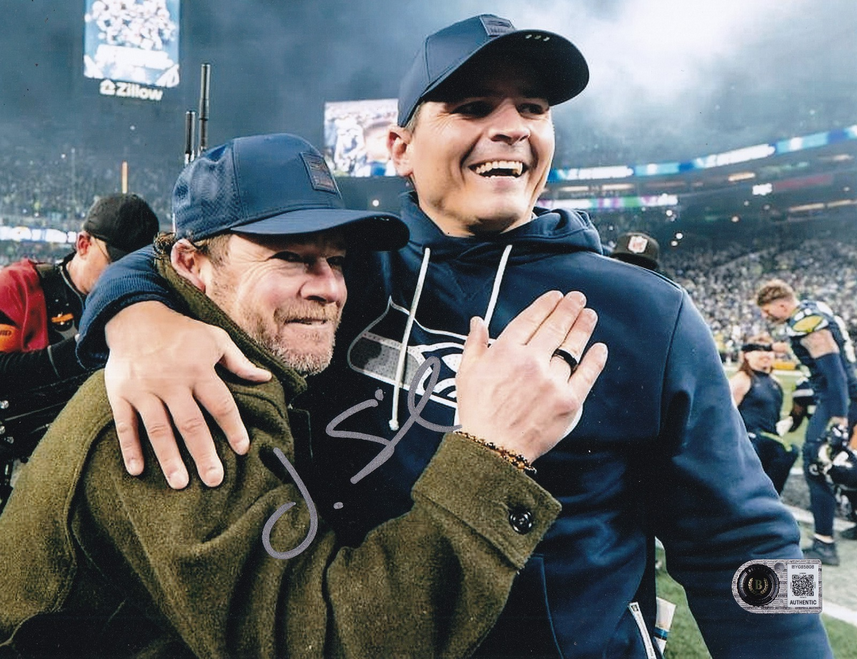 JOHN SCHNEIDER signed (SEATTLE SEAHAWKS) football 8X10 photo BECKETT BY085808