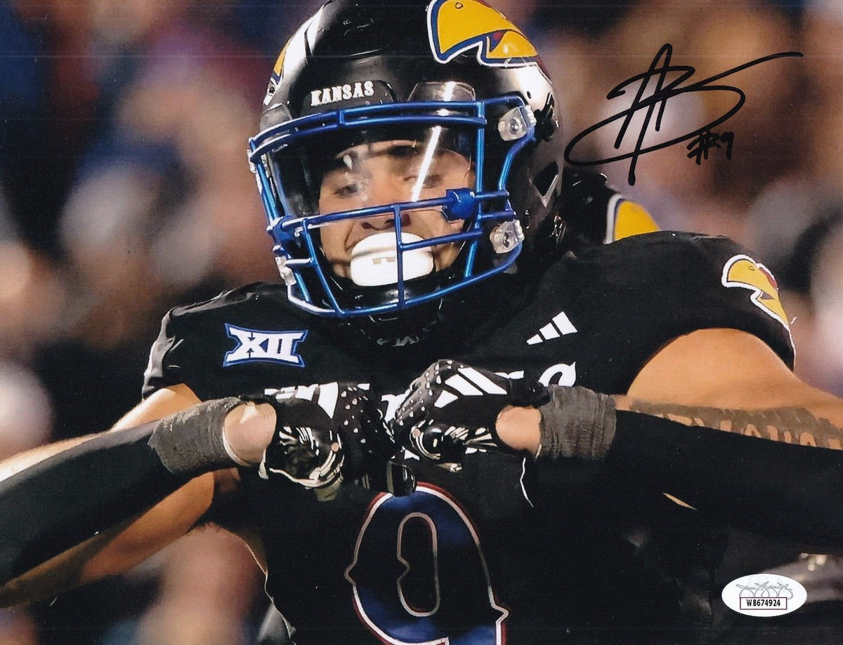 AUSTIN BOOKER signed (KANSAS JAYHAWKS) Football 8X10 photo JSA Witness WB674924
