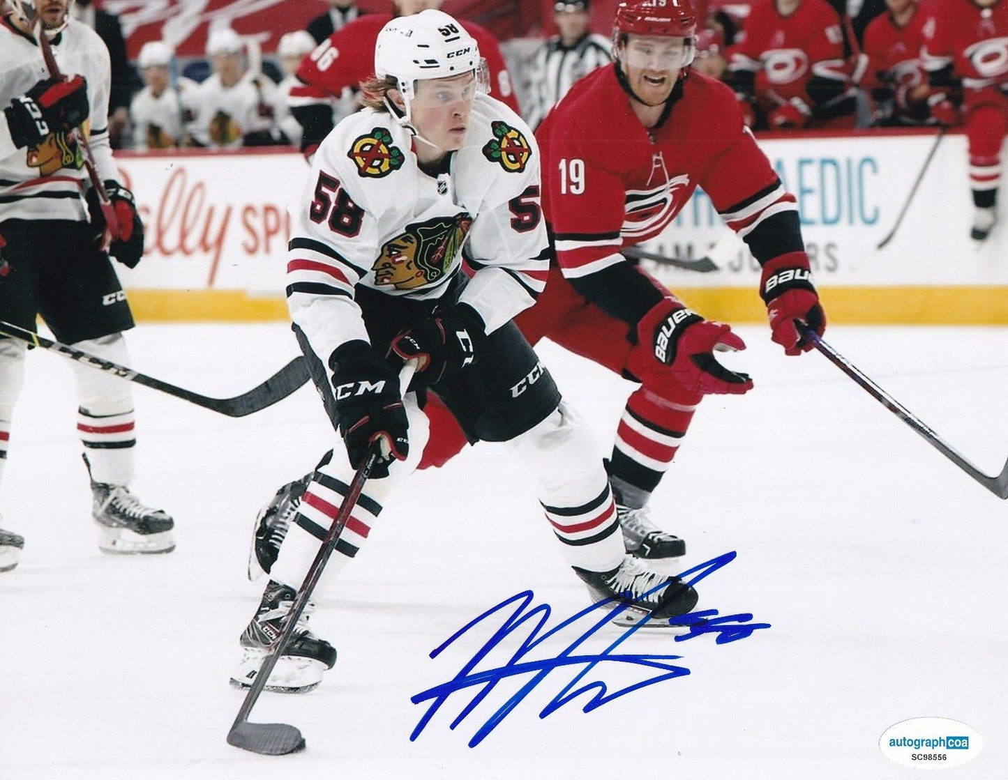 MACKENZIE ENTWISTLE signed (CHICAGO BLACKHAWKS) Hockey 8X10 photo ACOA SC98556