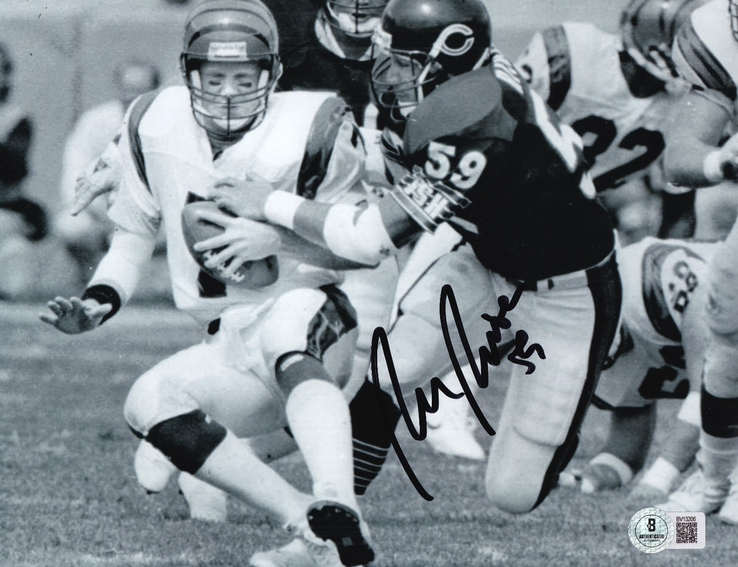 RON RIVERA signed (CHICAGO BEARS) football 8X10 photo BECKETT BAS BV13206