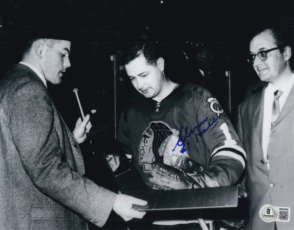 GLENN HALL signed (CHICAGO BLACKHAWKS) Hockey 8X10 photo BECKETT BAS BW52026