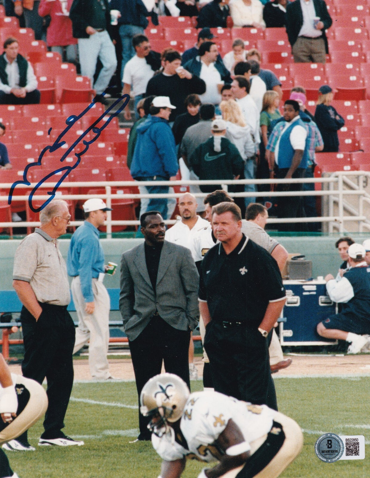 MIKE DITKA signed (NEW ORLEANS SAINTS) football 8X10 photo BECKETT BAS BS22850