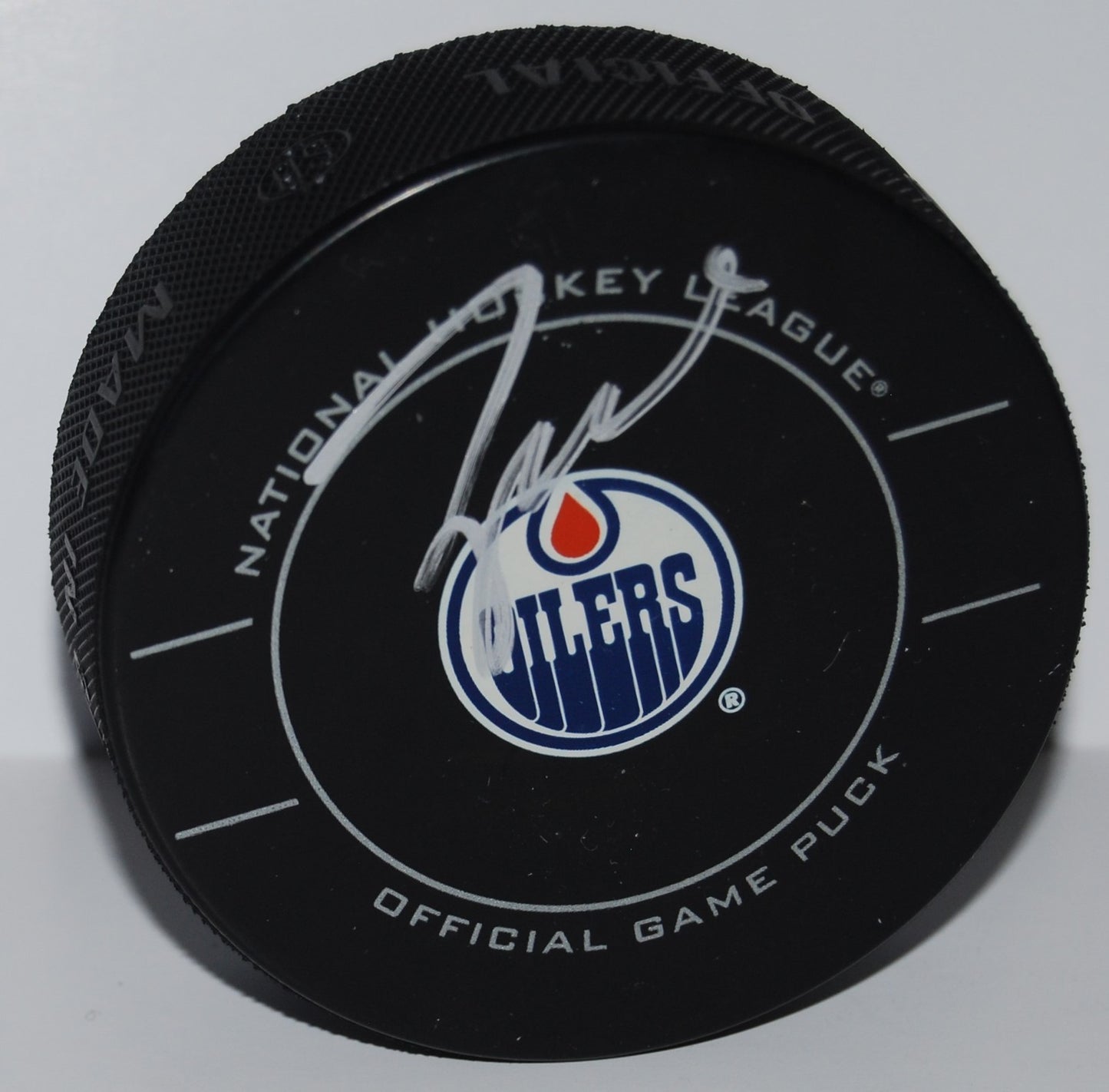 TAYLOR HALL signed (EDMONTON OILERS) Official game hockey puck W/COA #4