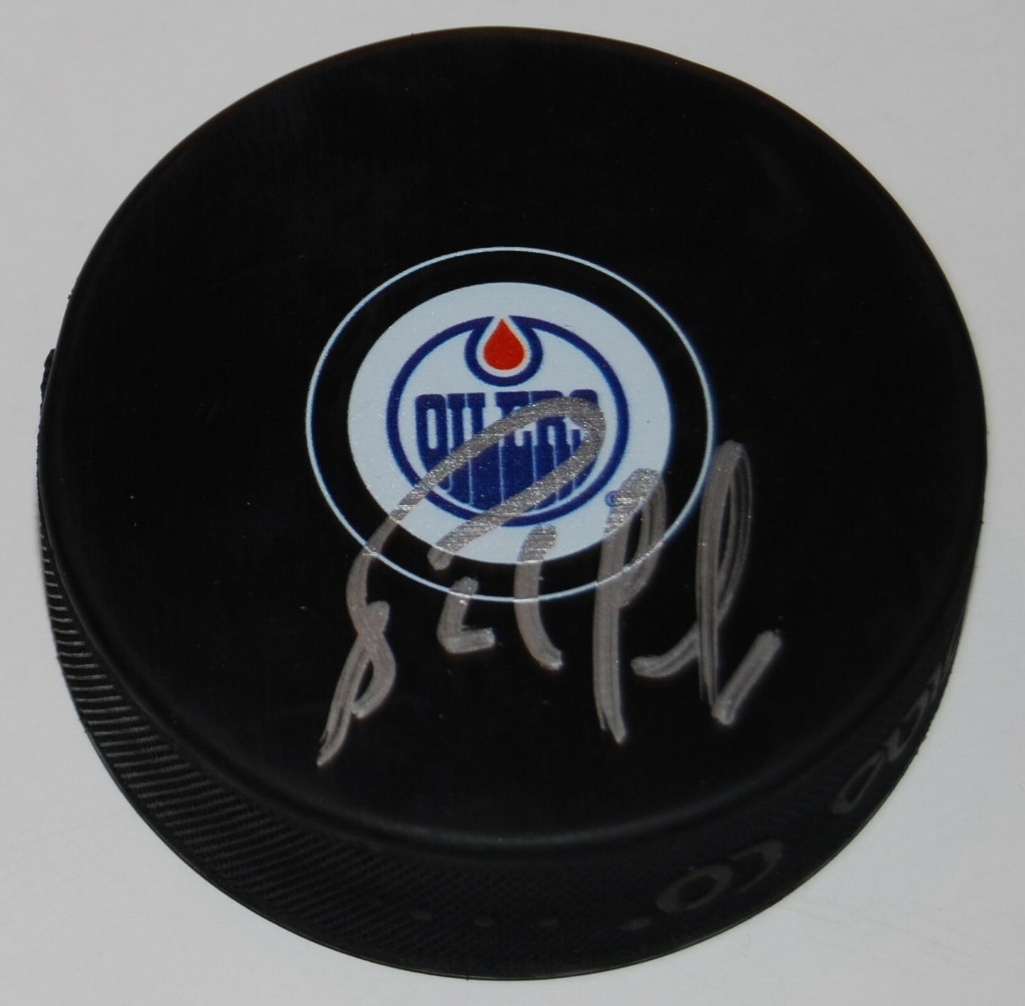 BERNIE NICHOLLS signed (EDMONTON OILERS) souvenir logo hockey puck W/COA