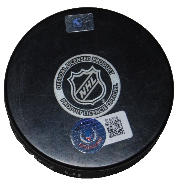 CHICO RESCH signed (NEW YORK ISLANDERS) hockey puck BECKETT BAS BL52618