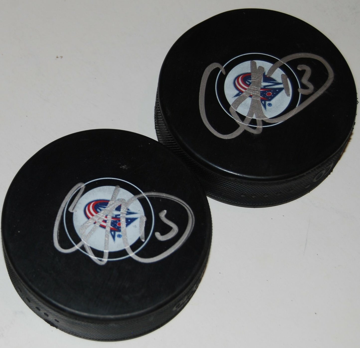 CAM ATKINSON signed (COLUMBUS BLUE JACKETS) autographed hockey puck W/COA