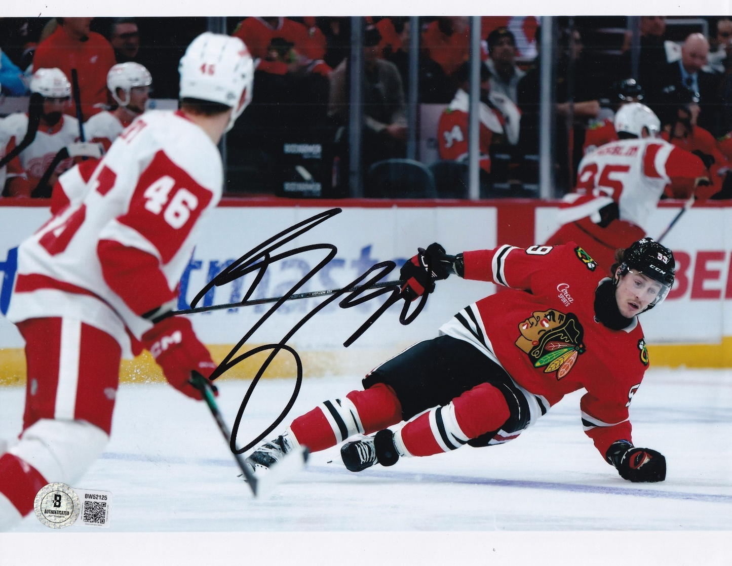 TYLER BERTUZZI signed (CHICAGO BLACKHAWKS) Hockey 8X10 photo BECKETT BAS BW52125