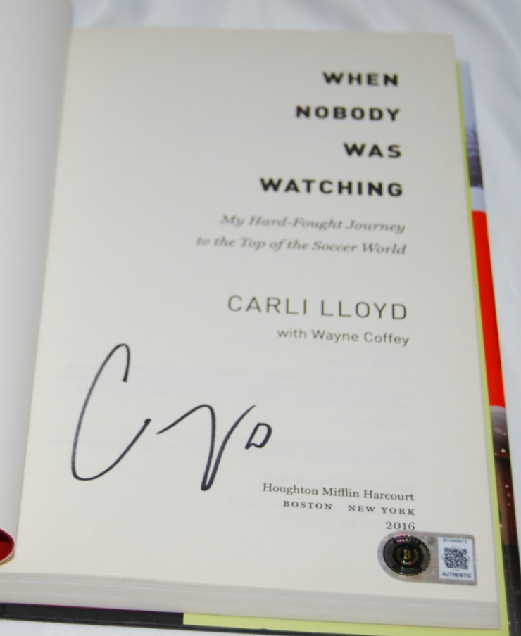 CARLI LLOYD signed (TEAM USA WOMENS SOCCER) hardcover book BECKETT BY085973