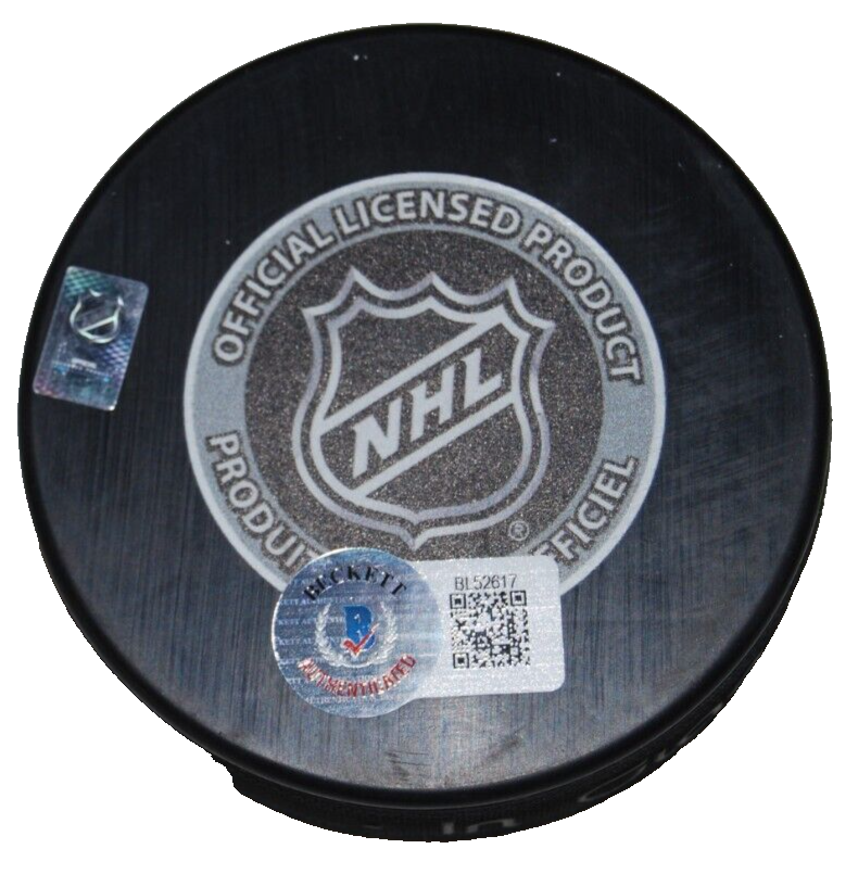 DOUG GILMOUR signed (CALGARY FLAMES) 1989 Champs hockey puck BECKETT BAS BL52617
