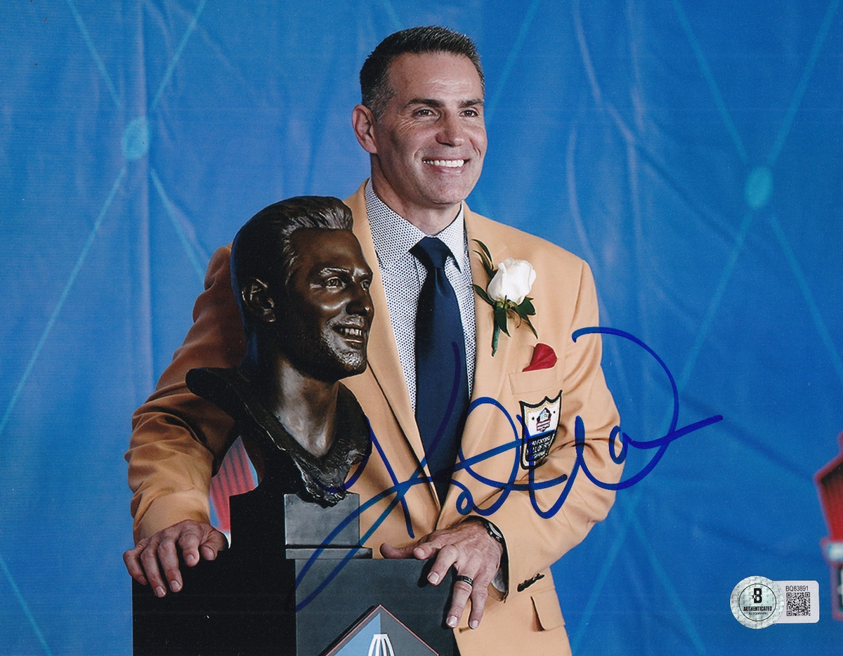 KURT WARNER signed (ST LOUIS RAMS) football 8X10 photo BECKETT BAS BQ83891