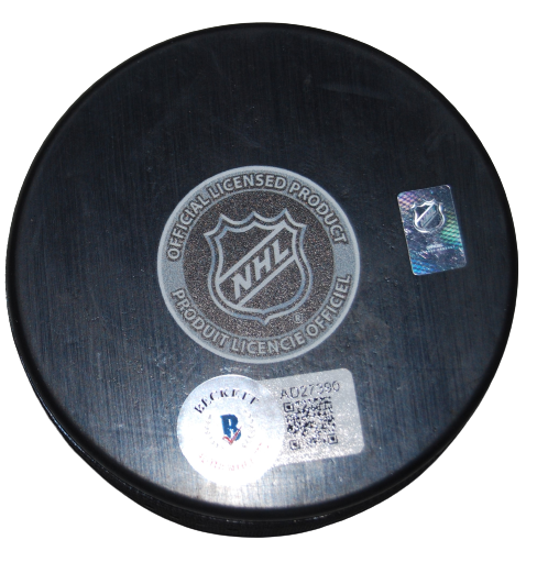 TAYLOR HALL signed (CHICAGO BLACKHAWKS) Hockey logo puck BECKETT BAS AD27390