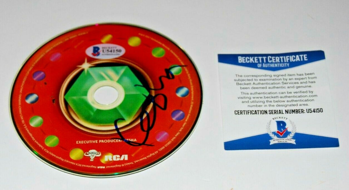 KESHA signed (RAINBOW) CD *FULL NAME* W/COA *KE$HA*autographed (PRAYING) BECKETT