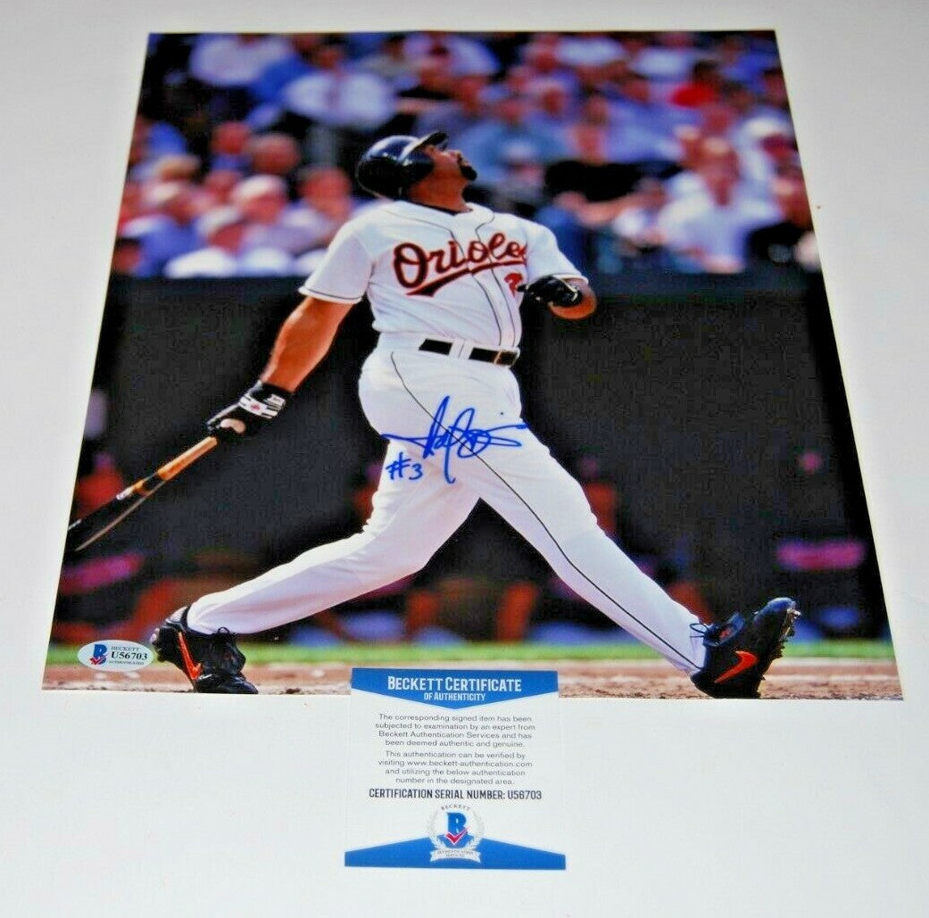 HAROLD BAINES signed (BALTIMORE ORIOLES) baseball 11X14 photo BECKETT BAS