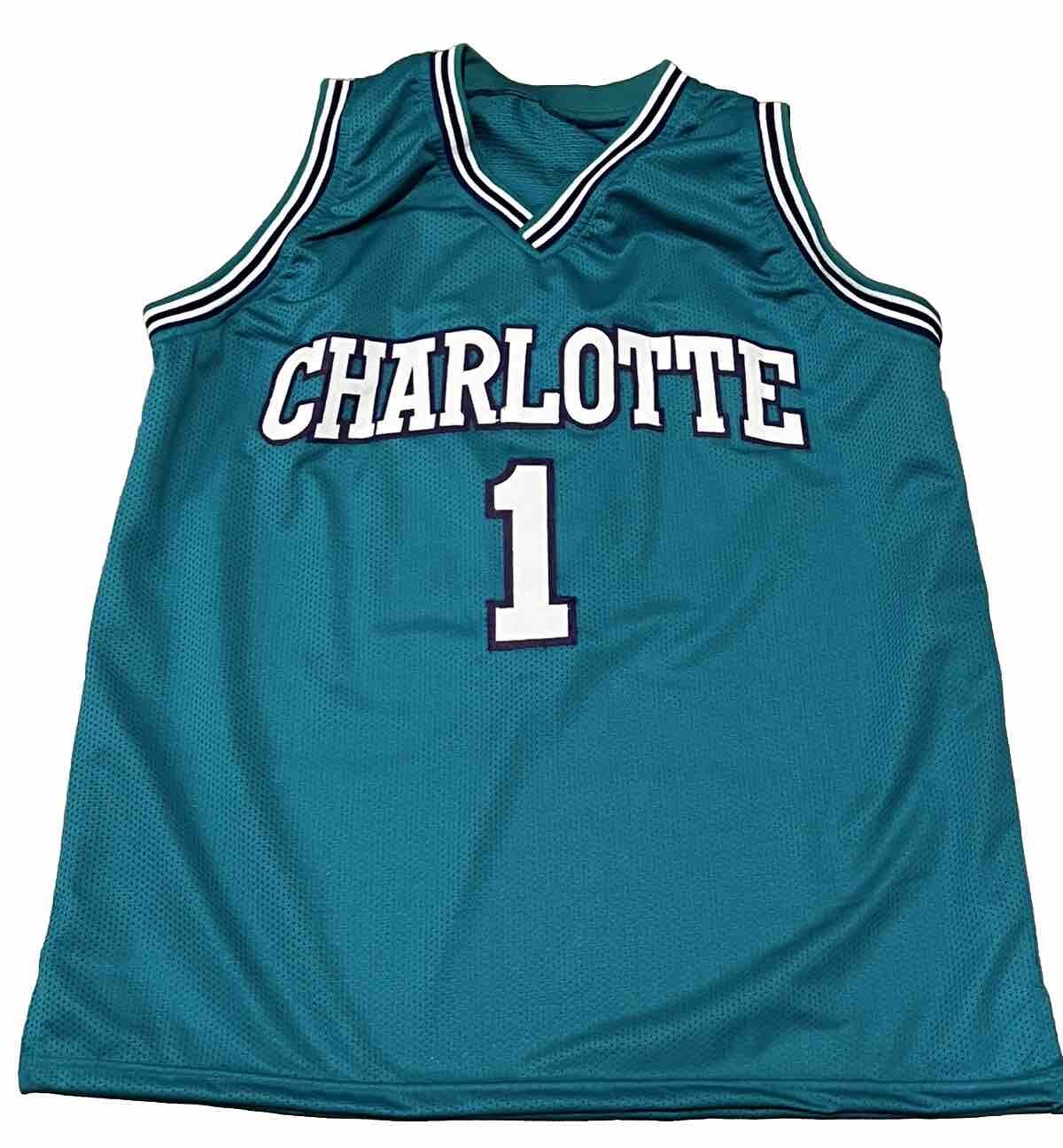 MUGSEY BOGUES signed (CHARLOTTE HORNETS) basketball jersey Beckett Witnessed