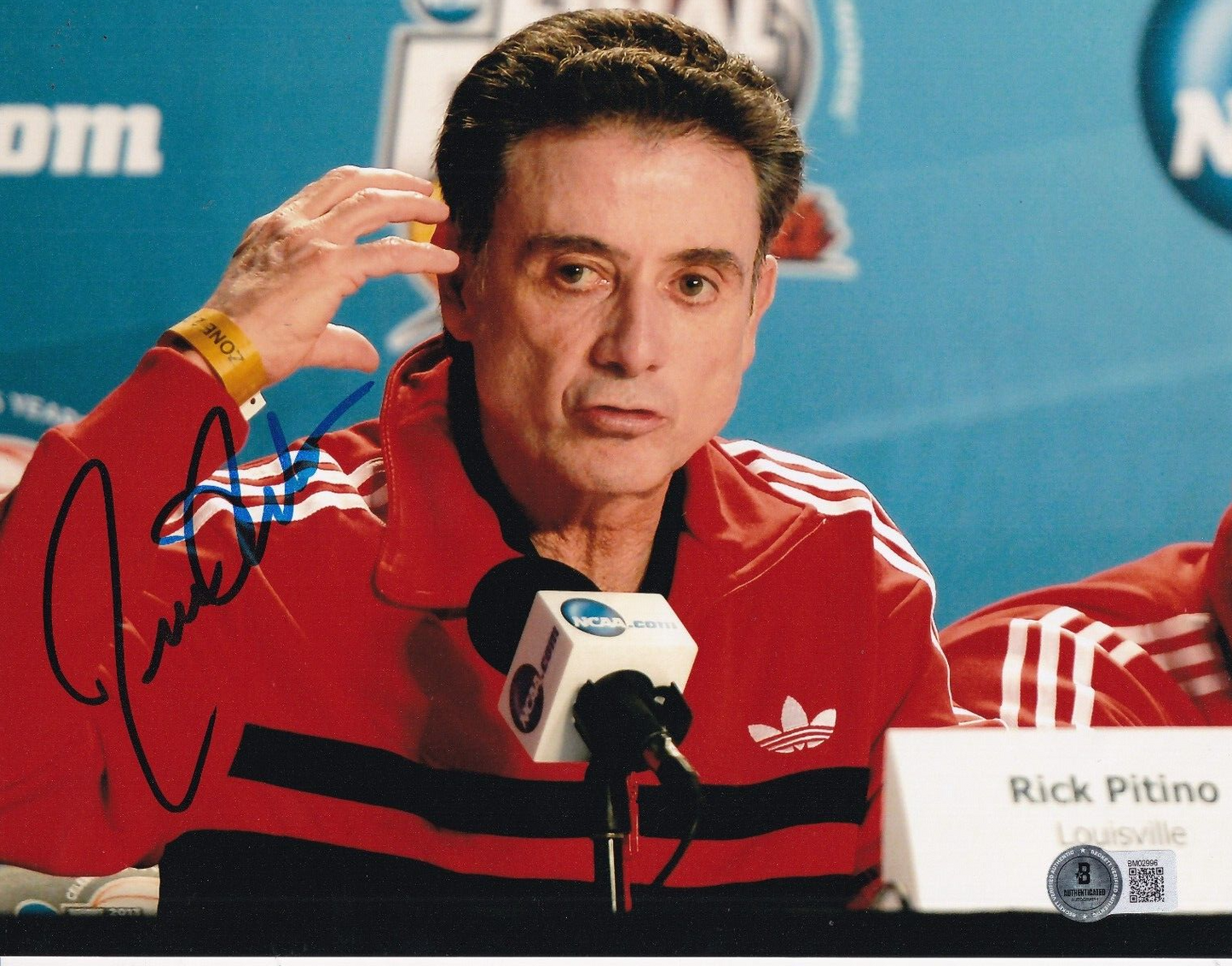 RICK PITINO signed (LOUISVILLE CARDINALS) basketball 8X10 photo BECKETT BM02996