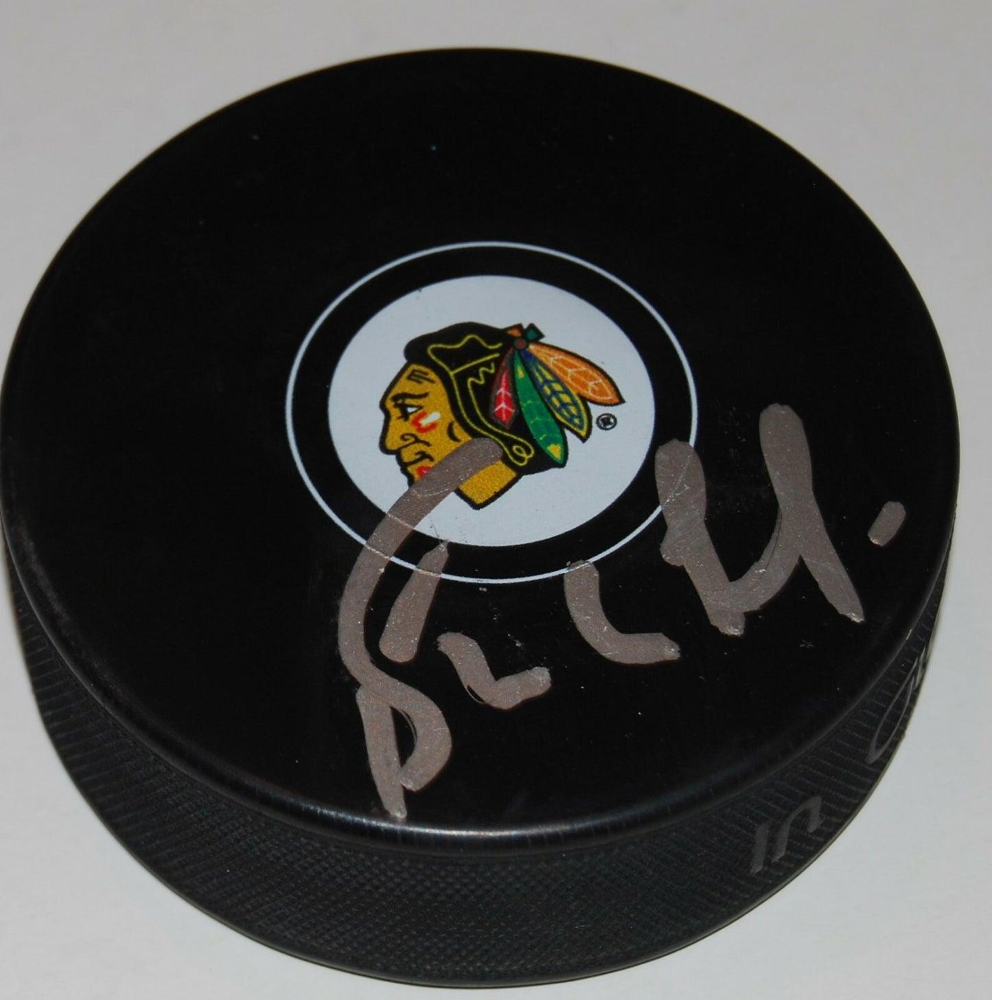 BERNIE NICHOLLS signed (CHICAGO BLACKHAWKS) souvenir logo hockey puck W/COA