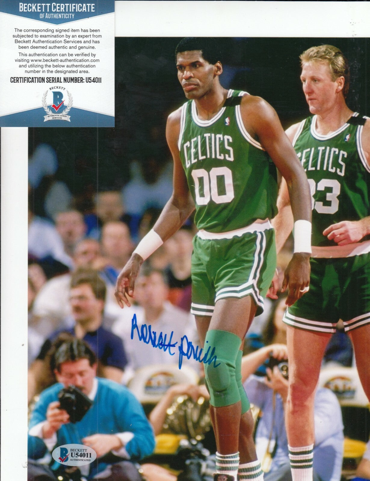 ROBERT PARISH signed (BOSTON CELTICS) basketball 8X10 photo BECKETT BAS U54011