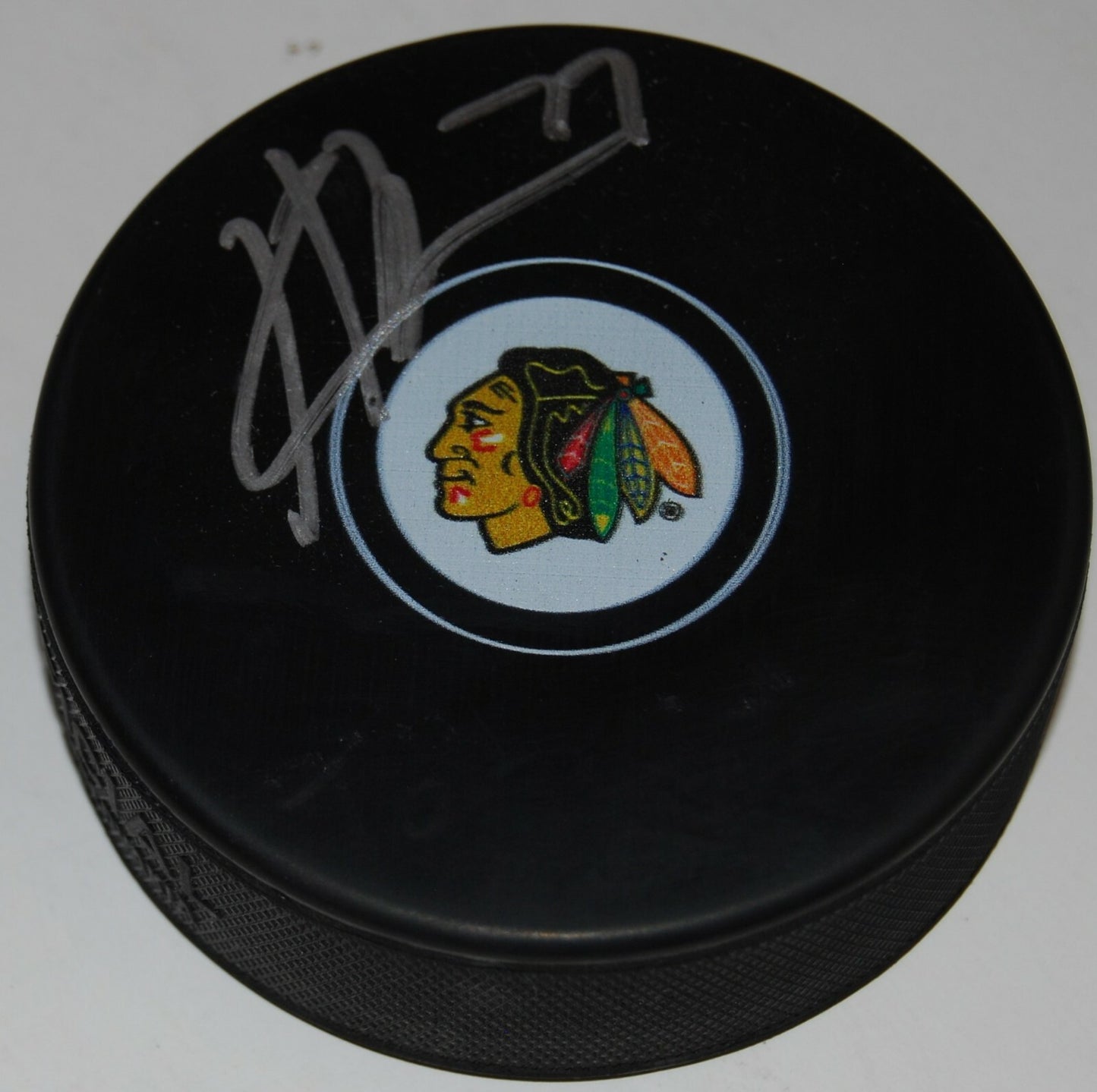 KIRBY DACH signed (CHICAGO BLACKHAWKS) Rookie autographed hockey puck W/COA