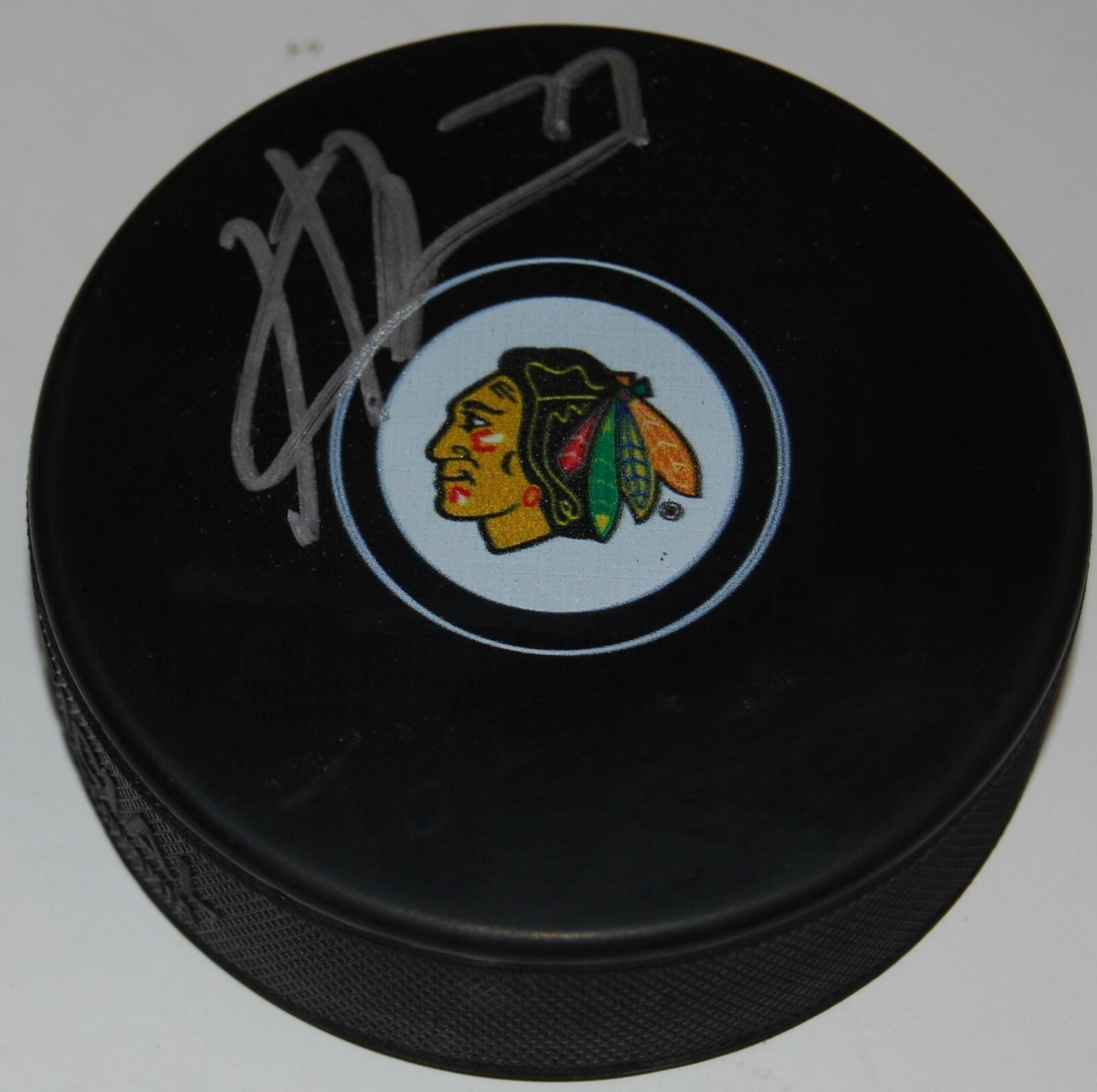 KIRBY DACH signed (CHICAGO BLACKHAWKS) Rookie autographed hockey puck W/COA