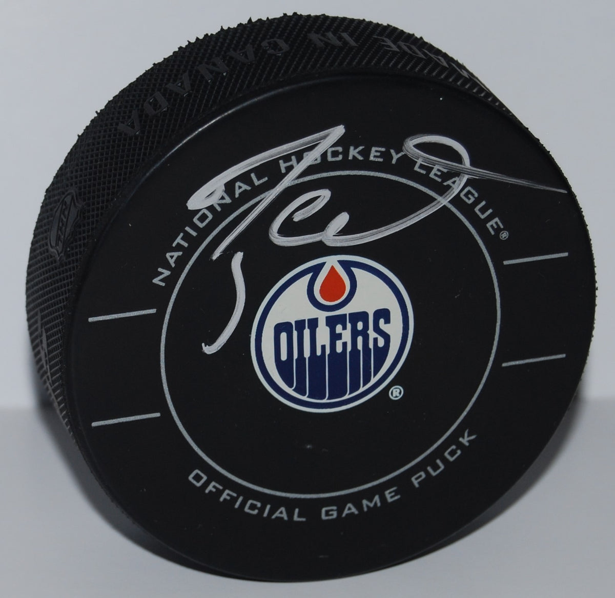 TAYLOR HALL signed (EDMONTON OILERS) Official game hockey puck W/COA #1