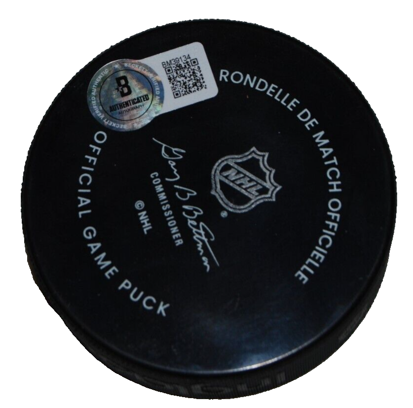 CHRIS CHELIOS signed (CHICAGO BLACKHAWKS) official game puck BECKETT BAS BM39134