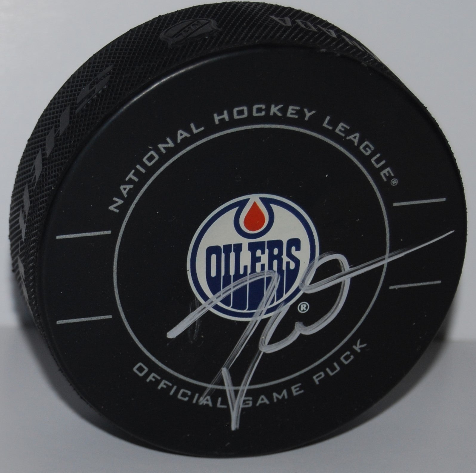 TAYLOR HALL signed (EDMONTON OILERS) Official game hockey puck W/COA #2