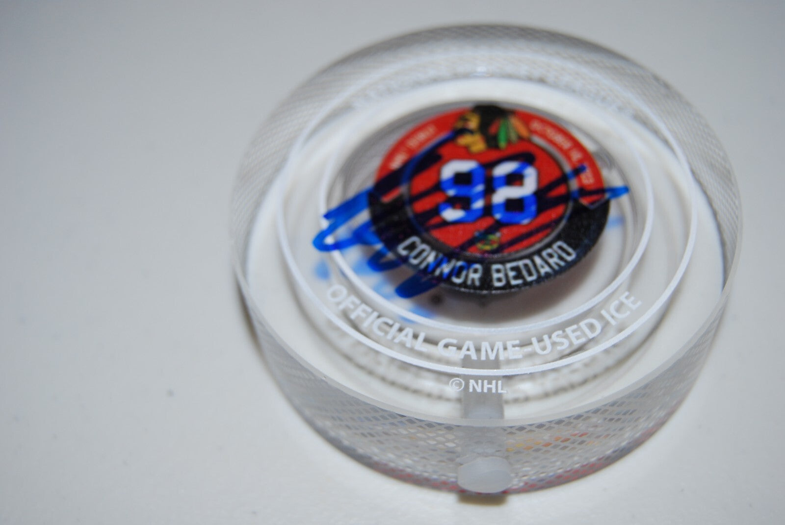 CONNOR BEDARD signed (CHICAGO BLACKHAWKS) Debut Crystal puck BECKETT BAS AE14711