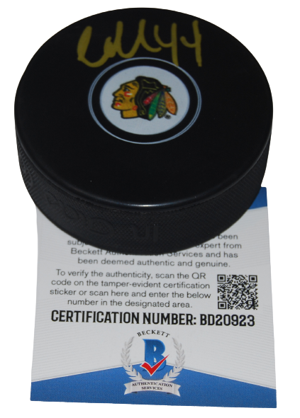 CALVIN DE HAAN signed (CHICAGO BLACKHAWKS) Souvenir hockey puck BECKETT BD20923