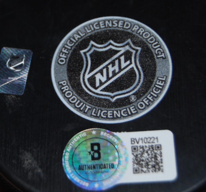 MATT GRZELCYK signed (CHICAGO BLACKHAWKS) 100th Anniversary puck BECKETT BV10221