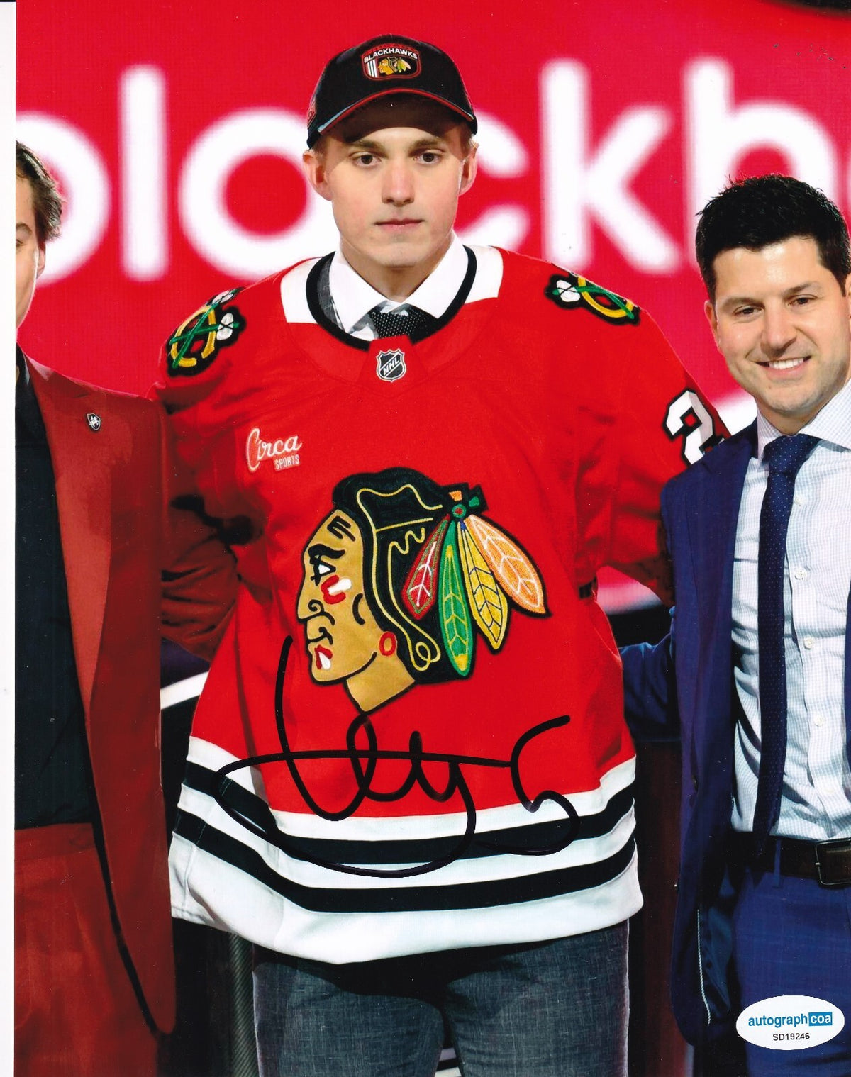 ARTYOM LEVSHUNOV signed (CHICAGO BLACKHAWKS) Hockey 8X10 photo ACOA SD19246