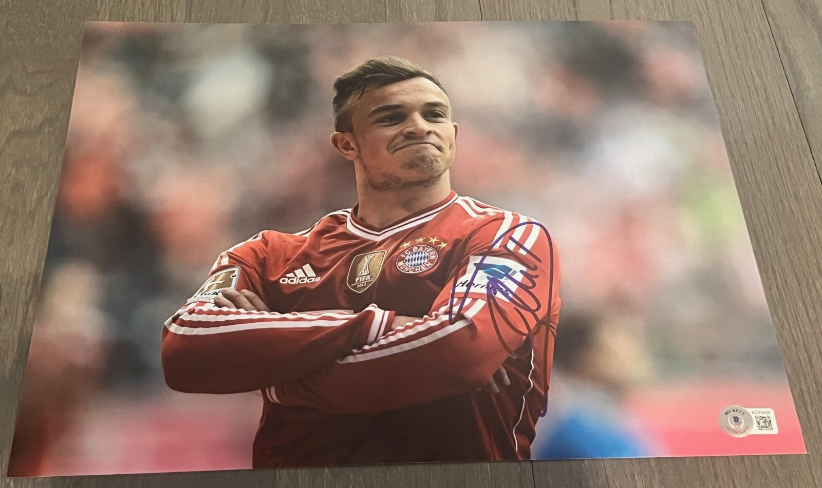 XHERDAN SHAQIRI signed (LIVERPOOL Switzerland Soccer 11X14 photo BECKETT AC93450