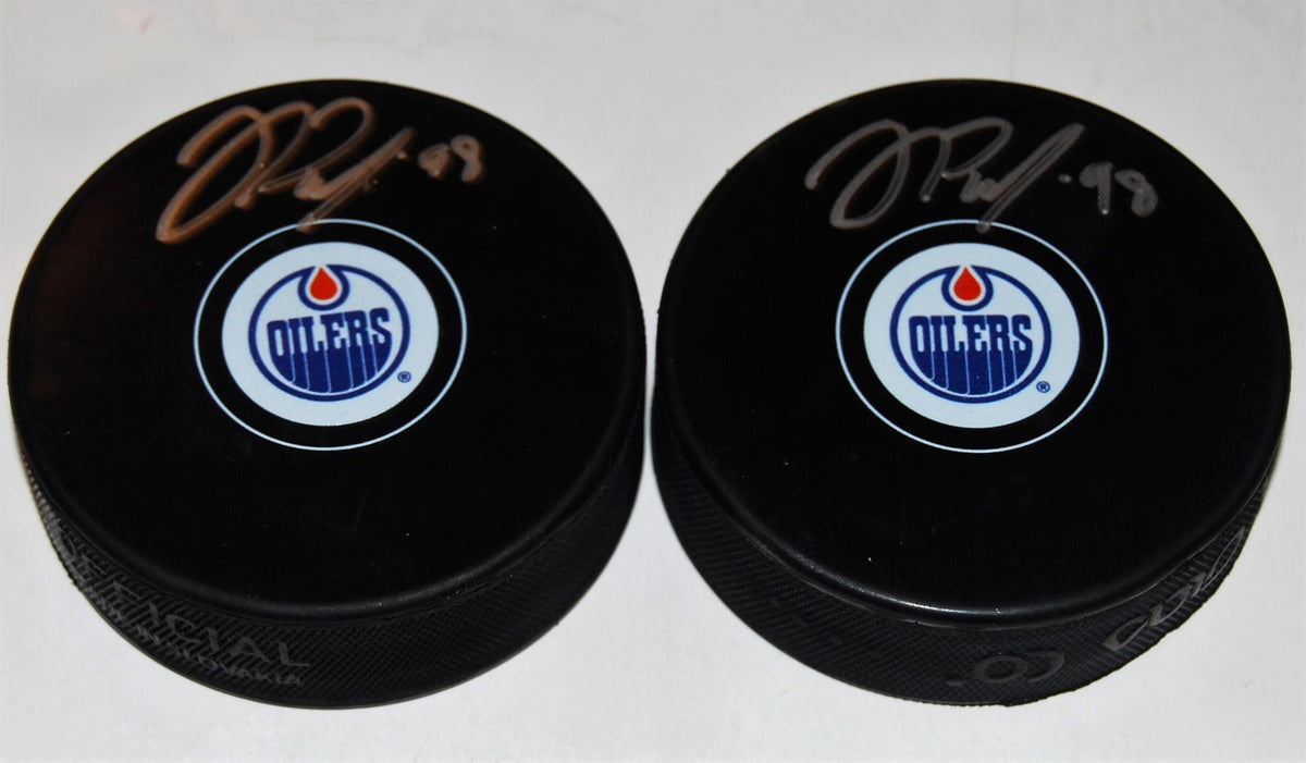 JESSE PULJUJARVI signed (EDMONTON OILERS) Souvenir autographed hockey Puck W/COA