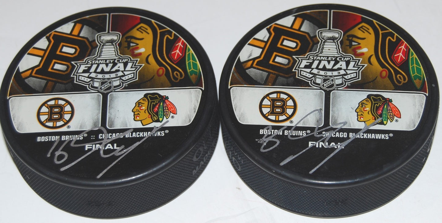 MARCUS KRUGER signed (CHICAGO BLACKHAWKS) 2013 STANLEY CUP DUALING puck W/COA