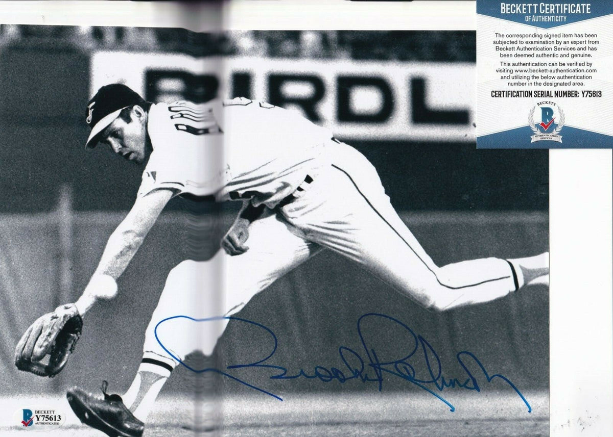 BROOKS ROBINSON signed (BALTIMORE ORIOLES) baseball 8X10 photo BECKETT Y75613