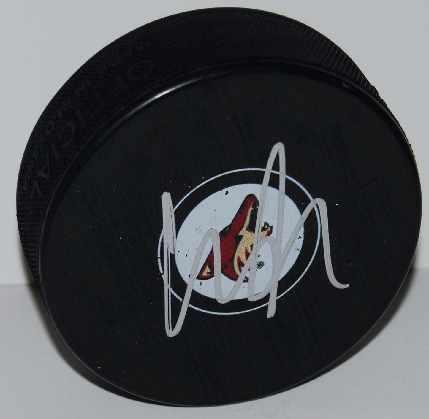 CHRISTIAN DVORAK signed (PHOENIX COYOTES) souvenir logo hockey puck W/COA #1
