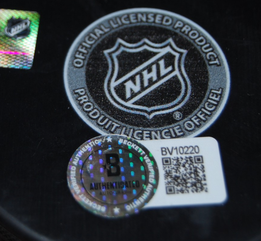 MATT GRZELCYK signed (CHICAGO BLACKHAWKS) 100th Anniversary puck BECKETT BV10220