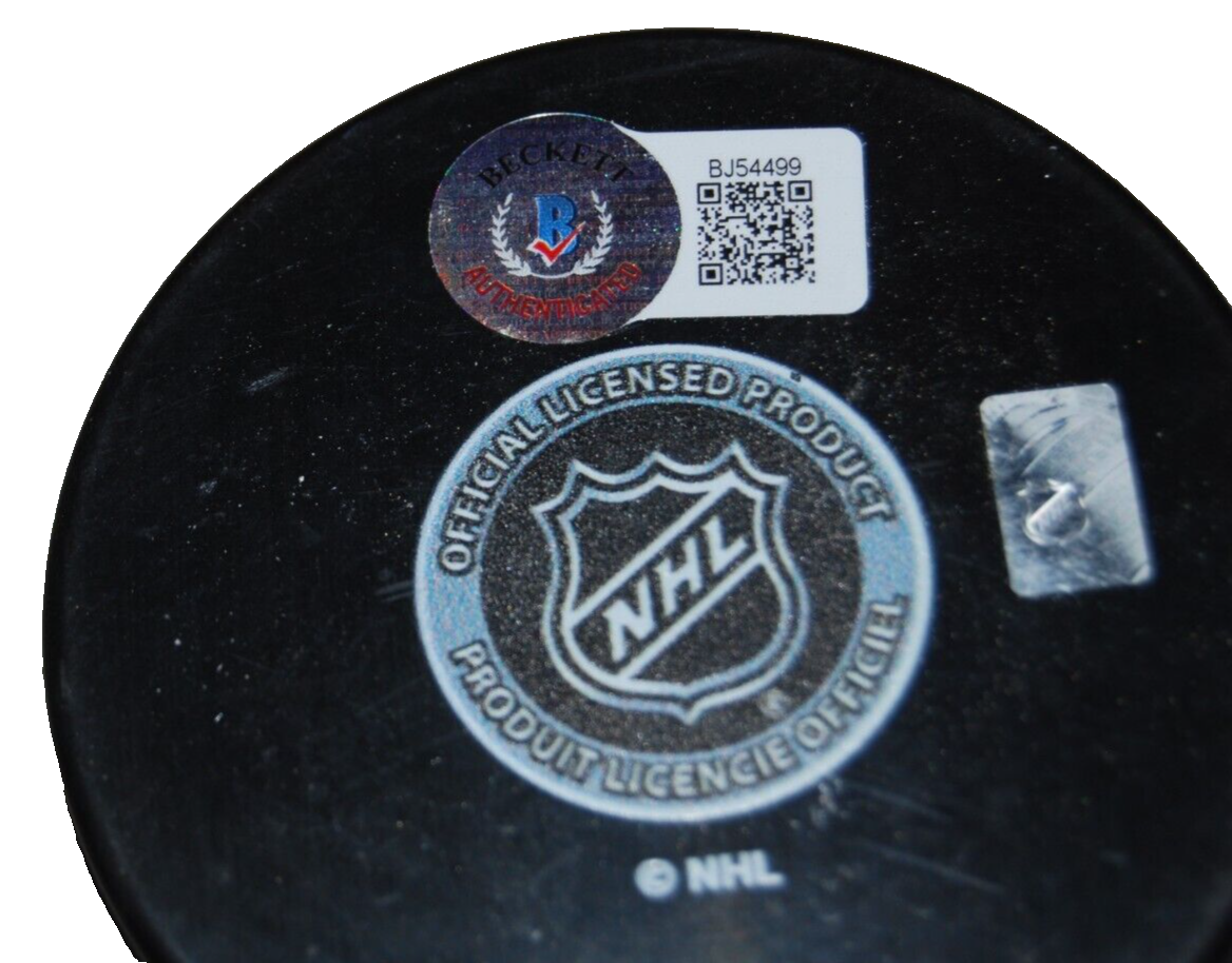 RICK BOWNESS signed (WINNIPEG JETS) autographed hockey puck BECKETT BAS BJ54499