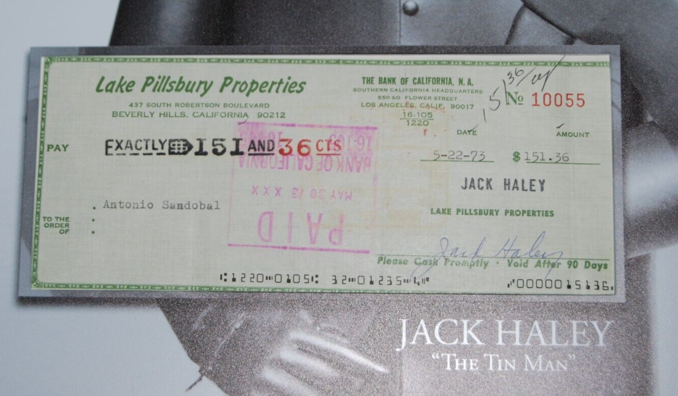JACK HALEY signed (THE WIZARD OF OZ) bank check matted with 11X14 Display W/COA