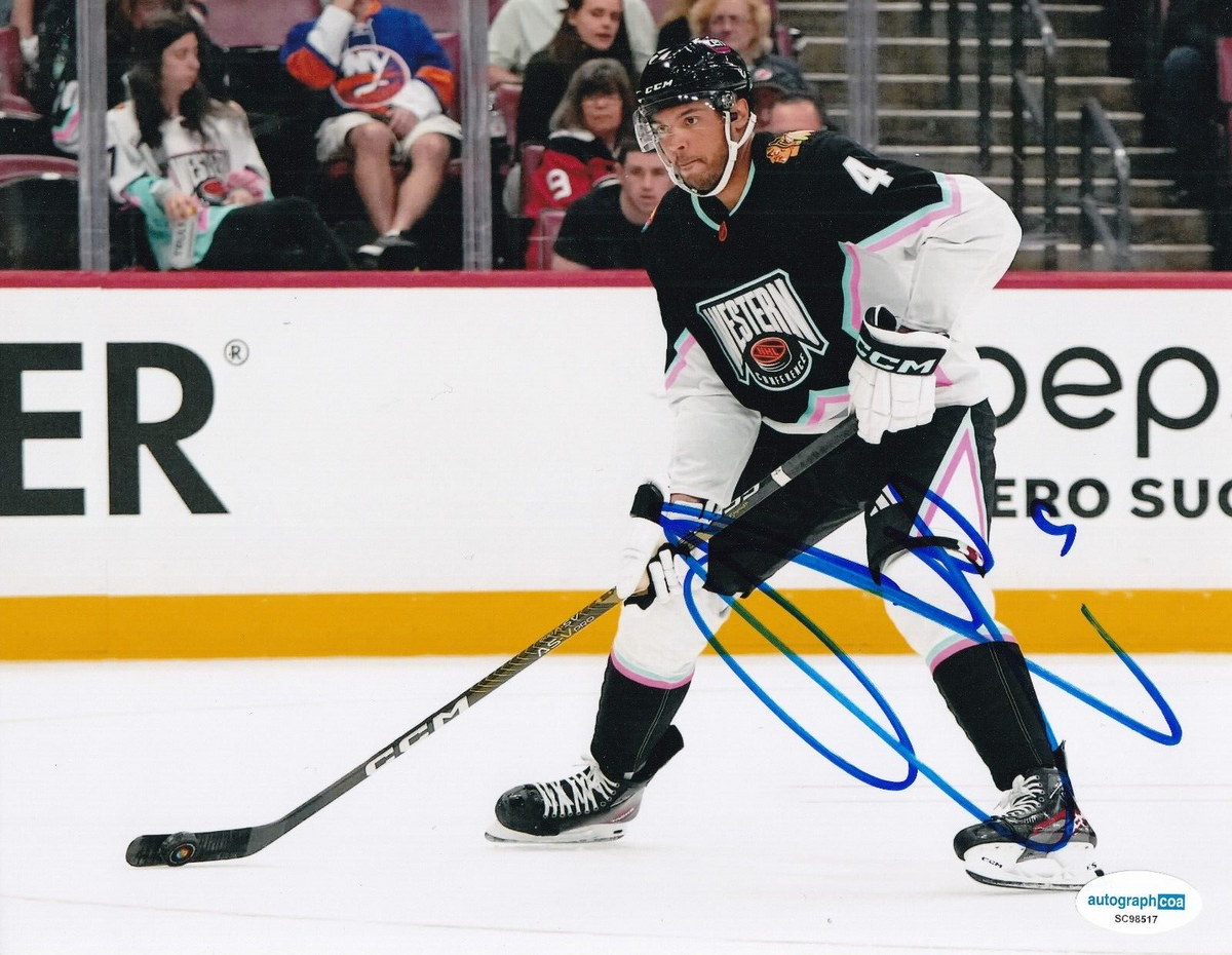 SETH JONES signed (CHICAGO BLACKHAWKS) Hocket 8X10 photo ACOA SC98517