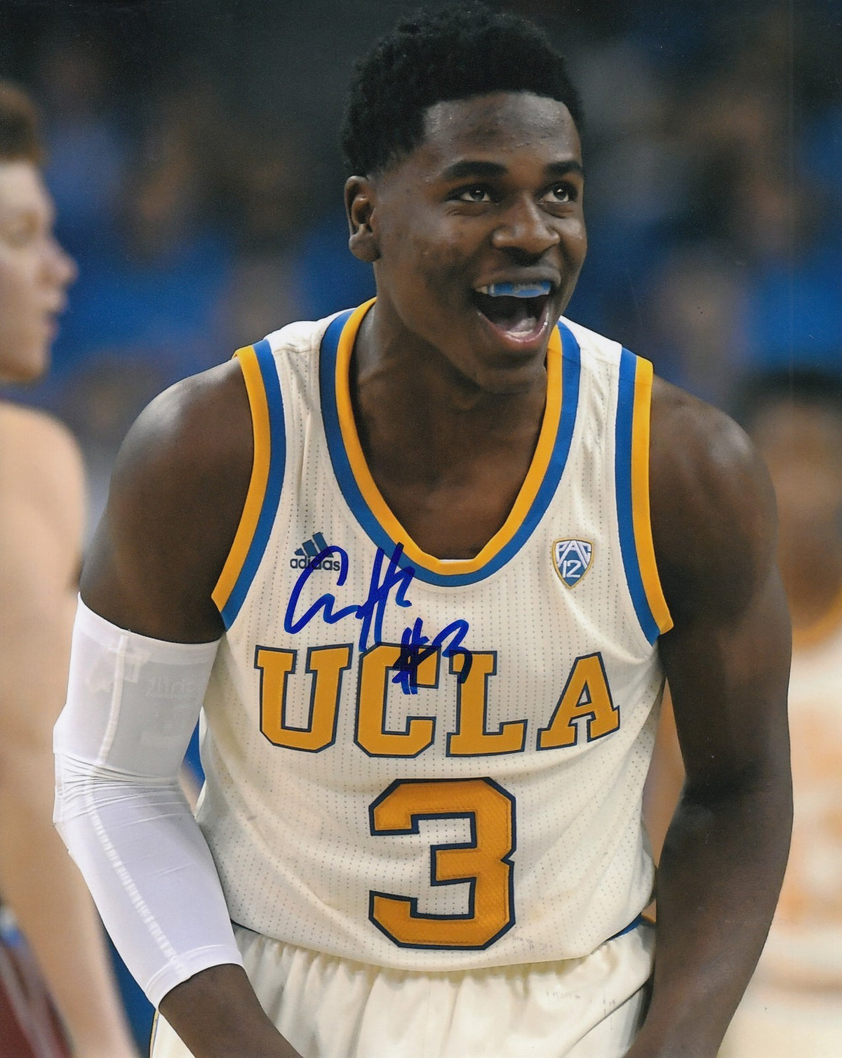 AARON HOLIDAY signed (UCLA BRUINS) basketball 8X10 photo *NBA DRAFT* W/COA #5
