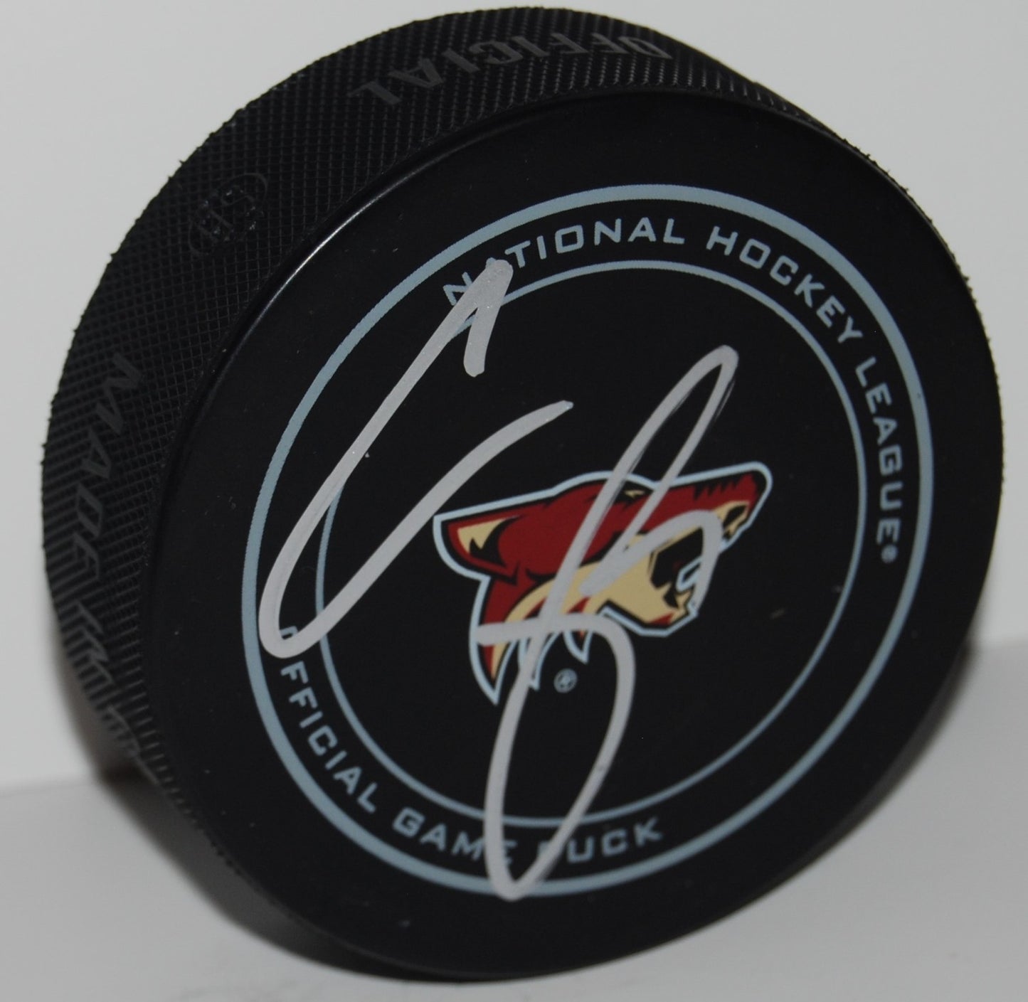 CLAYTON KELLER signed (PHOENIX COYOTES) Official game hockey puck W/COA