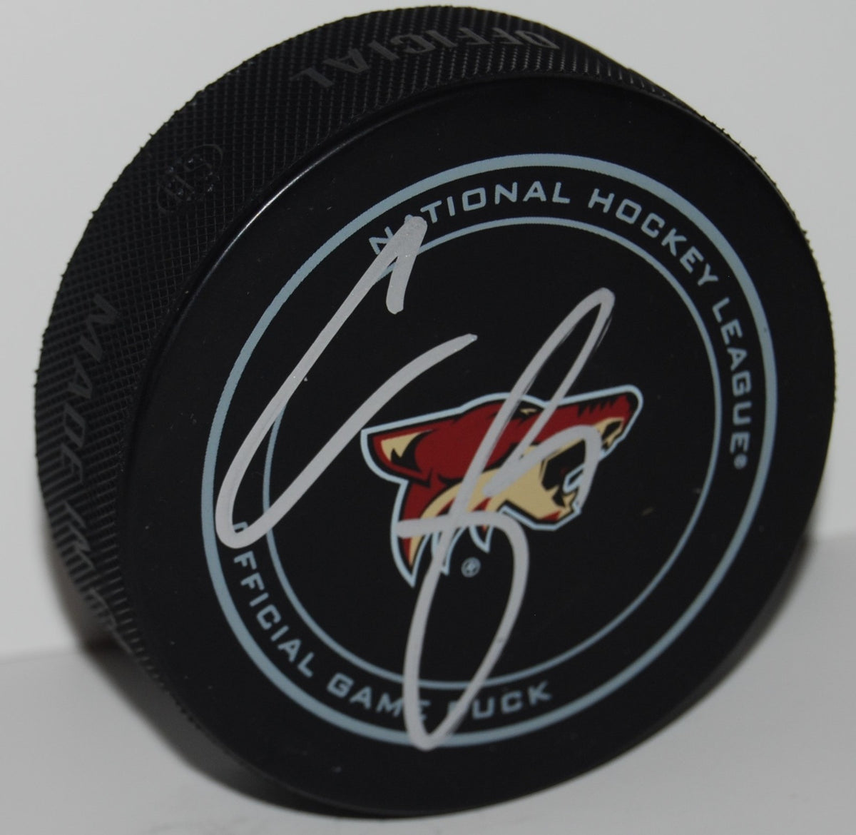 CLAYTON KELLER signed (PHOENIX COYOTES) Official game hockey puck W/COA
