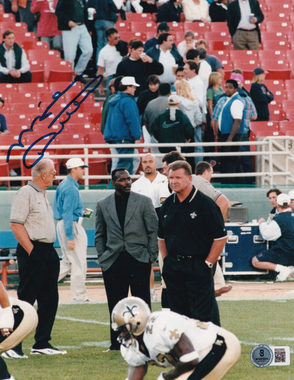 MIKE DITKA signed (NEW ORLEANS SAINTS) football 8X10 photo BECKETT BAS BS22850