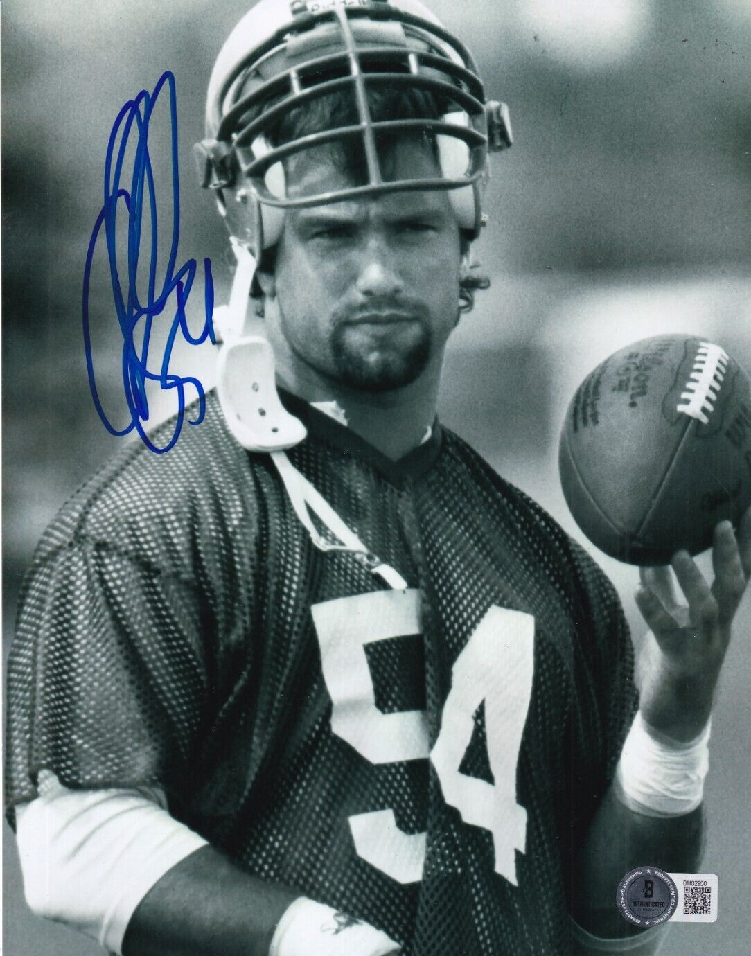 CHRIS SPIELMAN signed (DETROIT LIONS) football 8X10 photo BECKETT BAS BM02950