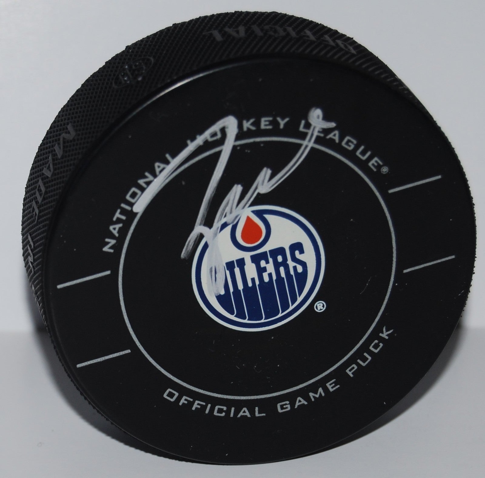 TAYLOR HALL signed (EDMONTON OILERS) Official game hockey puck W/COA #4