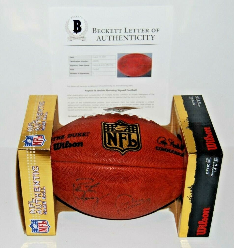 PEYTON and ARCHIE MANNING signed WILSON NFL game football BECKETT BAS FATHER SON
