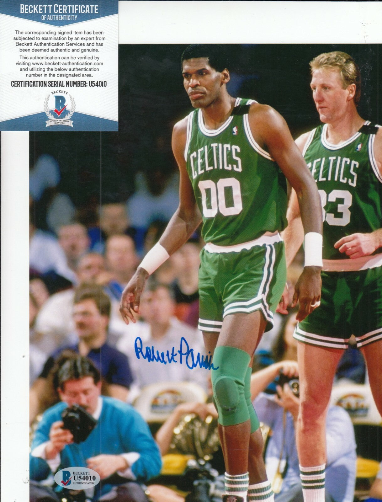 ROBERT PARISH signed (BOSTON CELTICS) basketball 8X10 photo BECKETT BAS U54010