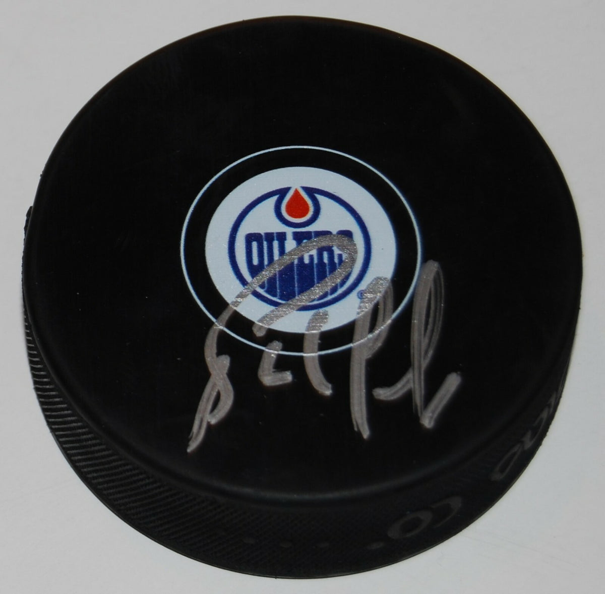 BERNIE NICHOLLS signed (EDMONTON OILERS) souvenir logo hockey puck W/COA