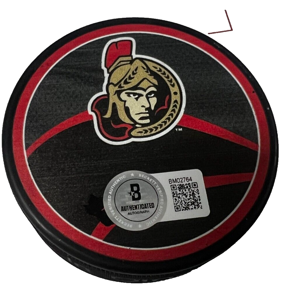JACQUES MARTIN signed (OTTAWA SENATORS) Hockey puck BECKETT BAS BM02764