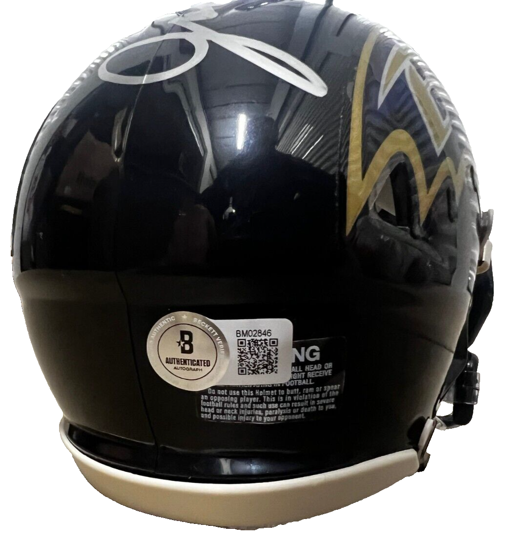 JOHN HARBAUGH signed (BALTIMORE RAVNES) mini football helmet BECKETT BM02846